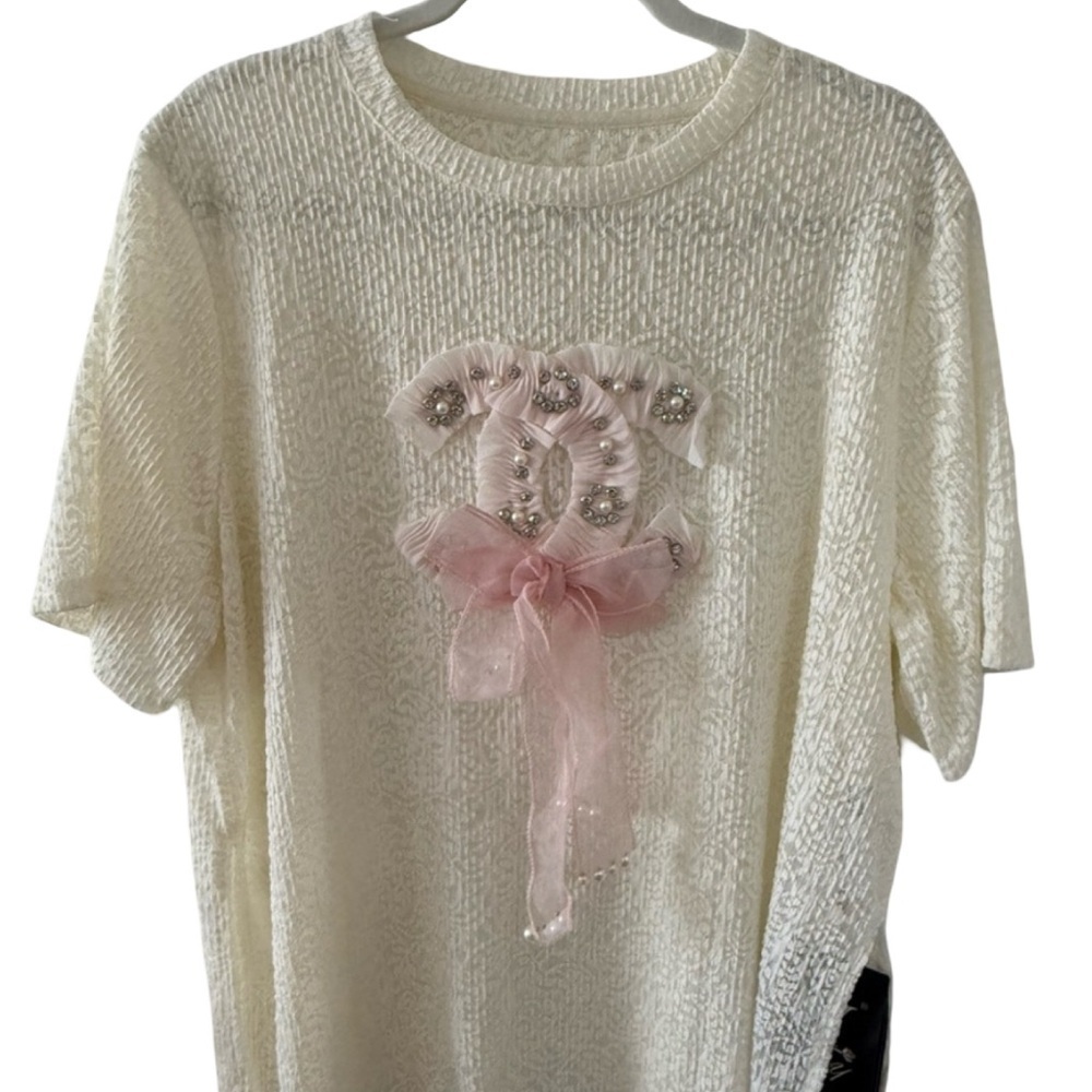 Elegant Cream women Top with Pink Bow. Size L / XL